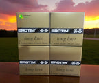 Erotim Long Love Condoms in gold packaging (4 packs of 2’s) placed against a romantic sunset background, designed to delay climax and extend pleasure — available online in Canada.