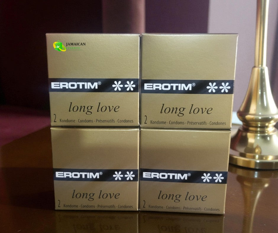 Erotim Long Love Condoms 4 packs of 2’s in gold packaging displayed on a bedside table, designed for longer-lasting performance and enhanced pleasure — available online in Canada