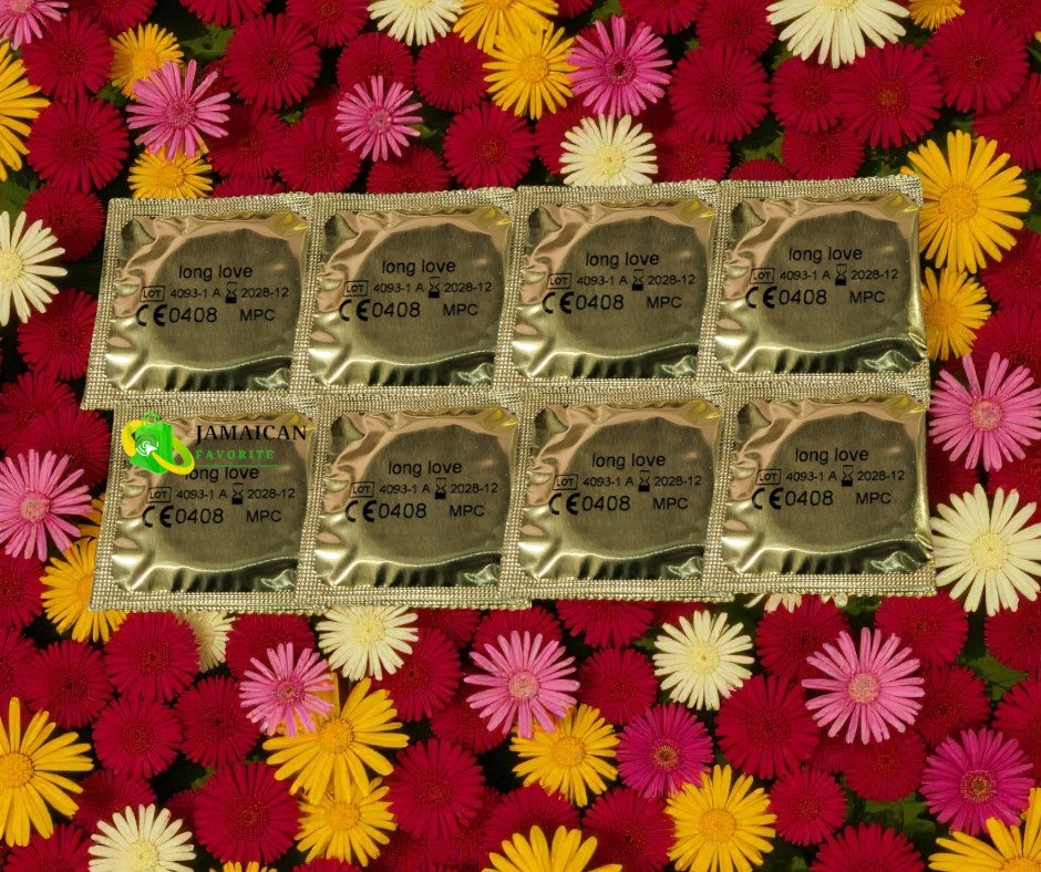 Erotim Long Love Condoms gold wrappers (8 pieces) arranged on colorful flower background, symbolizing romance and extended pleasure — available for online purchase in Canada.