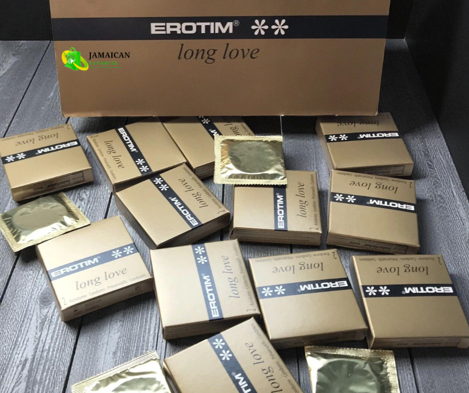 Erotim Long Love Condoms gold boxes and individual foil packs displayed on a wooden surface, designed to prolong pleasure, enhance performance, and provide safe protection for men in Canada.