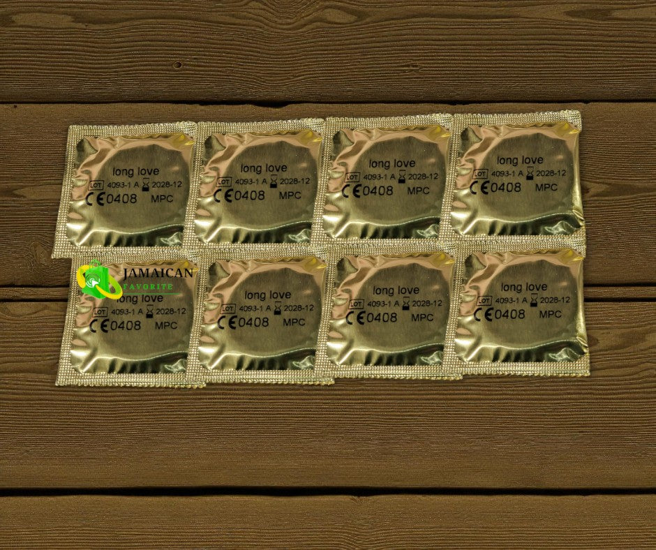 Erotim Long Love Condoms in gold foil wrappers arranged on a wooden surface, designed for longer-lasting pleasure, protection, and confidence — available online in Canada.