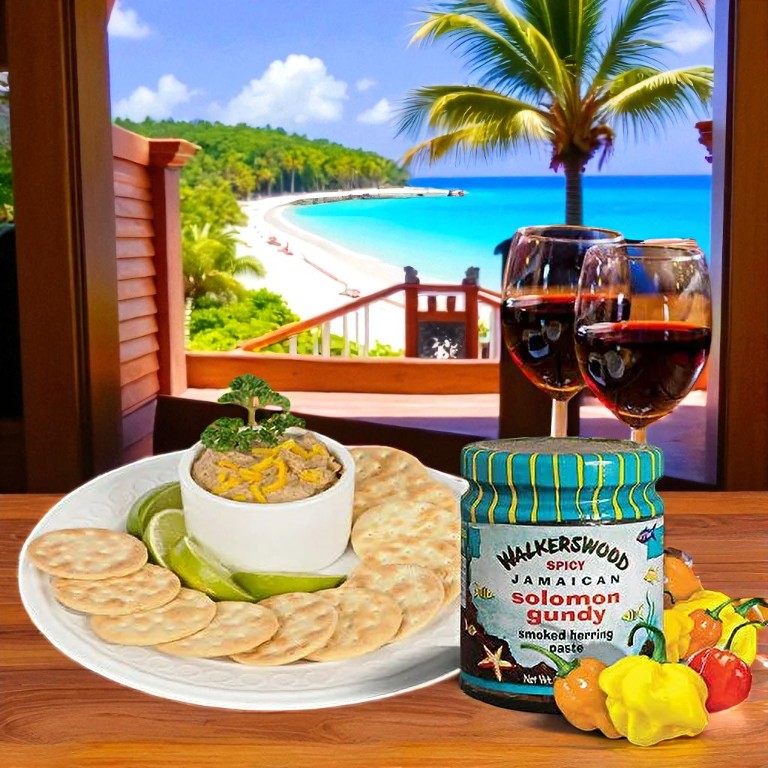 Dessert platter with crackers, fruit, and a jar of Walkerswood Spicy Jamaican Solomon Island paste, set against a tropical beach backdrop.
