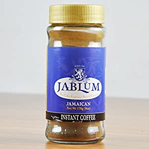 A jar of Jablum Instant Coffee with a blue label, indicating it is a Jamaican product.